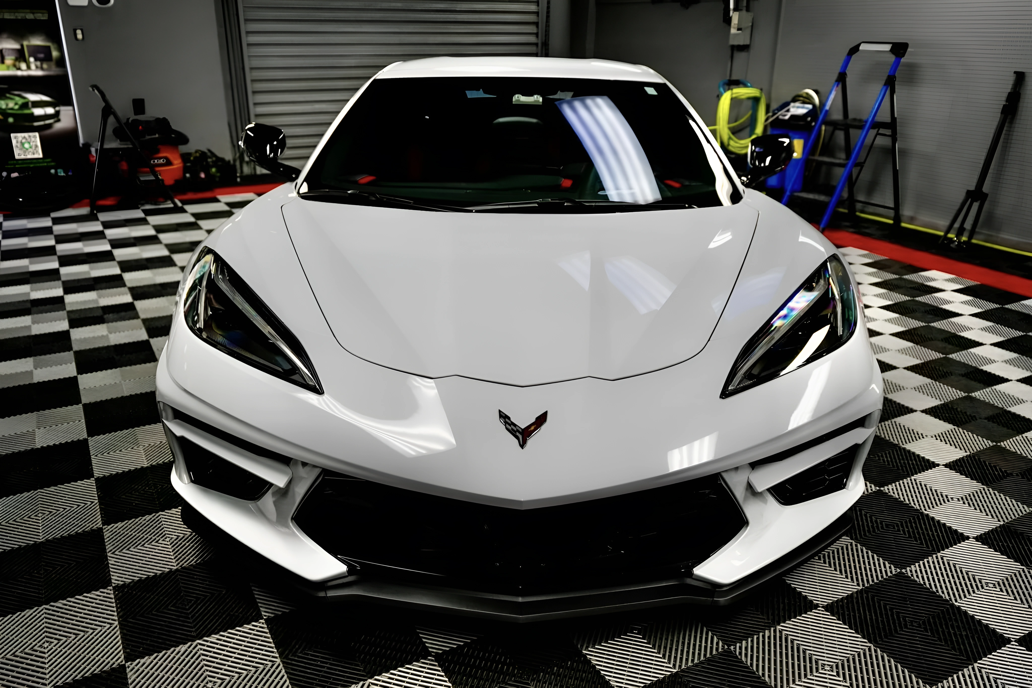 White Corvette in the Legacy Detail Studio workshop